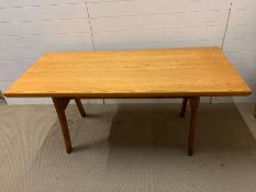 A vintage pine kitchen table with spear feet (H72cm W150cm D70cm)