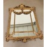 A Large Ornate Gilt frame bevel edged mirror (H 183 cm x L 127cm )