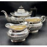 A Three piece silver tea set to include teapot, milk jug, sugar bowl (Arthur & John Zimmerman) Total