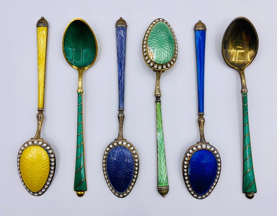 A selection of seven various enamel on silver spoons