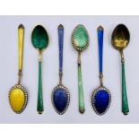 A selection of seven various enamel on silver spoons