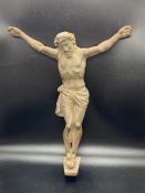 A bronzed cast iron sculpture of Jesus Christ on the cross (H36cm W32cm)