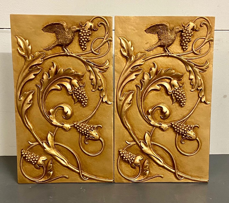 Two gilt wall hangings depicting birds and grape vines