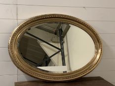 A regal silver oval mirrror by Blue Bird mirrror company (24 x 34inch)