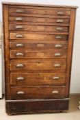 A Ten drawer collectors cabinet with brass cup handles