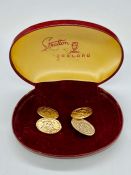 A Pair of 9ct gold Gents cuff links with ornate finish (Total Weight 7.3g)