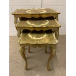 A Nest of three tables, gilt painted (H 58 cm x D 36 cm x W 57 cm)