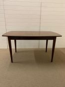 A teak dining table (H72cm W138cm D92cm)