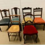 An Assortment of Dining chairs and Hall chairs of various ages.