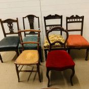 An Assortment of Dining chairs and Hall chairs of various ages.
