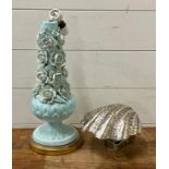 A teal table lamp (38cm H) with flowers decorations to sides along with a chrome shell style wall