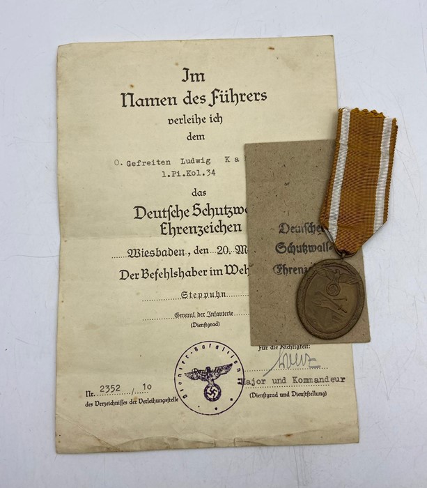 German West Wall medal in packet of issue with medal certificate