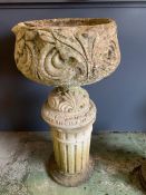 A garden planter on column base (H99cm Dia38cm)