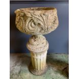 A garden planter on column base (H99cm Dia38cm)