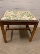 An oak dressing table stool