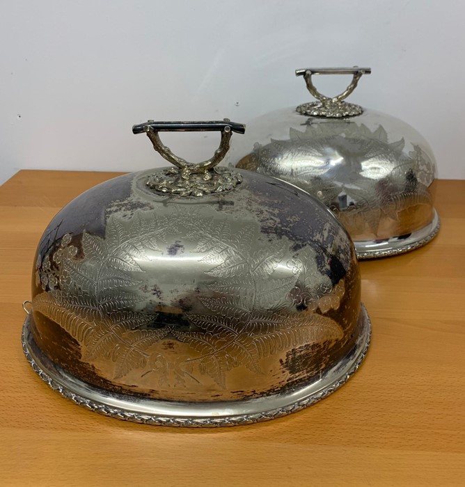 A Pair of substantial HH& S silver plated cloche with foliate engraving