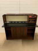 A Mid Century bar with wine bottle holders, ice bucket and serving shelf (H115cm W127cm D40cm)