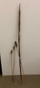 A vintage long bow and arrow set