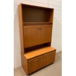 A Mid Century teak wall unit (H173cm W100cm D47cm)