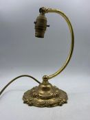 A Cast brass desk or side lamp with no shade.