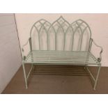 A metal garden bench painted pale green (H90cm W96cm D42cm)