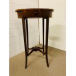 An Oval inlaid lamp or plate table on long tapering legs (W 46cm x D 29cm x H 71cm)