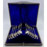 A cased set of twelve silver teaspoons and sugar nips by GGR, hallmarked for Sheffield 1898