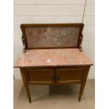 A washstand with marble top and splash back (H117cm W93cm D44cm)