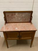A washstand with marble top and splash back (H117cm W93cm D44cm)