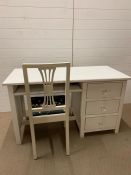 A solid painted desk and chair (H75cm W130cm D59cm)