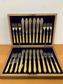 A superb cased set, twelve place setting silver and ivory fish eaters (Sheffield 1902)