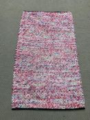An Indian woven rug in pink (5ft x 3ft)
