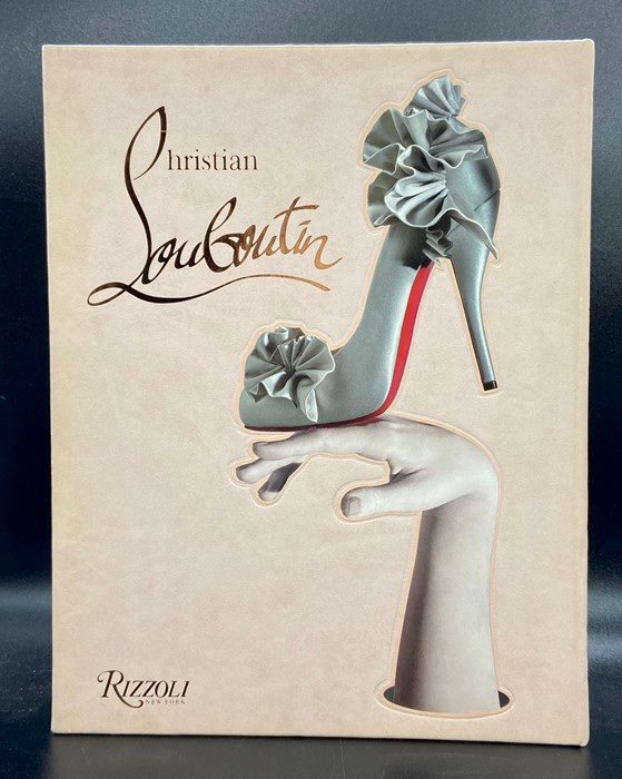 A large Christian Louboutin reference book by Rizzoli New York with two collectable Louboutin Beauty - Image 7 of 8