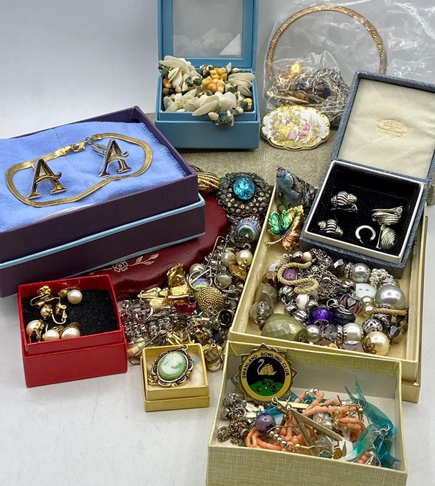 A large selection of costume jewellery and cuff links