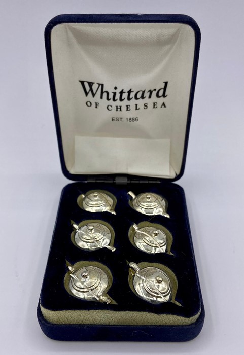 A boxed set of six teapot shaped place markers by Whittard