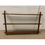 A wooden wall hanging rack (H72cm W105cm)