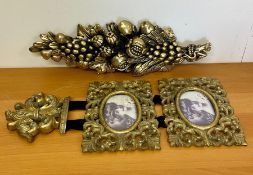 Two wall hanging decorative items