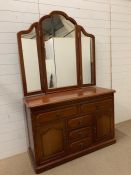 A sideboard with a mirrored to back with drawers and cupboard under (W123cm D47cm) (Mirror H113cm