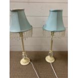 Two bedside lamps with beads to shade