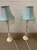 Two bedside lamps with beads to shade