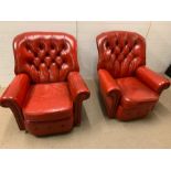 A pair of Mid Century red leather button back chairs