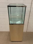 A modern glass display plinth (H110cm Sq37cm)