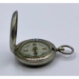 A Military compass by F Barker & Son, London 1917 VI 18202 (engraved to back of case)
