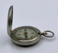 A Military compass by F Barker & Son, London 1917 VI 18202 (engraved to back of case)