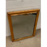 A wooden frame mirror (57cm x 72cm)