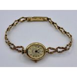 A Ladies Sovereign 9ct gold watch and strap (Total weight 8.8g)