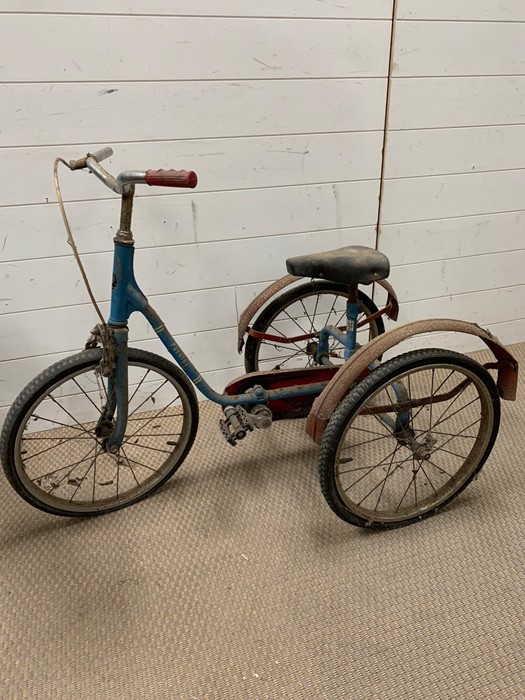 A Pashley child's tricycle with the words pickle on the side