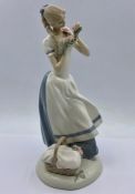 A porcelain figurine "Cecilia The Carnation Maiden" (24cm tall)