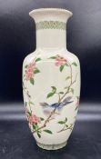 A porcelain cherry blossom design vase by Shibata Japan,