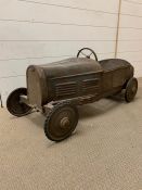 A vintage Citroen pedal car in original condition